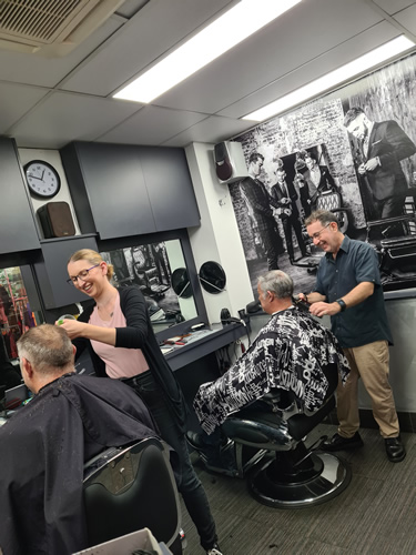 Joe and Rhi doing what they do best at the 'The Barber Room' delivering great hair styles for their regular customers at the Brisbane City CBD barber shop