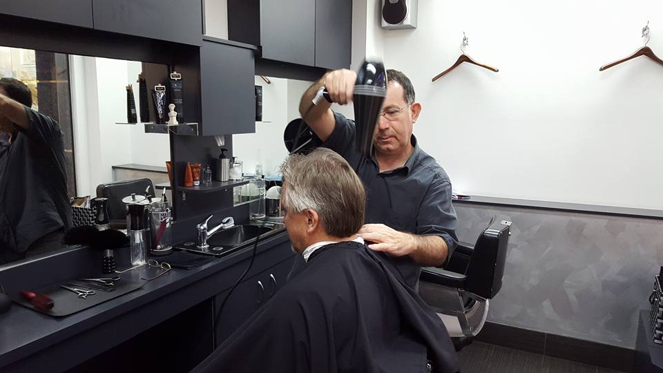 This traditional barber shop known as 'the Barber Room' has customers with a broad range of ages and all very satisfied