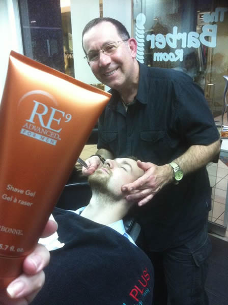 Joe Micale, owner of 'The Barber Room' styles one of his regular customers. He has customers of many ages at his Brisbane City CBD barber shop